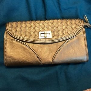 Bronze crossbody clutch